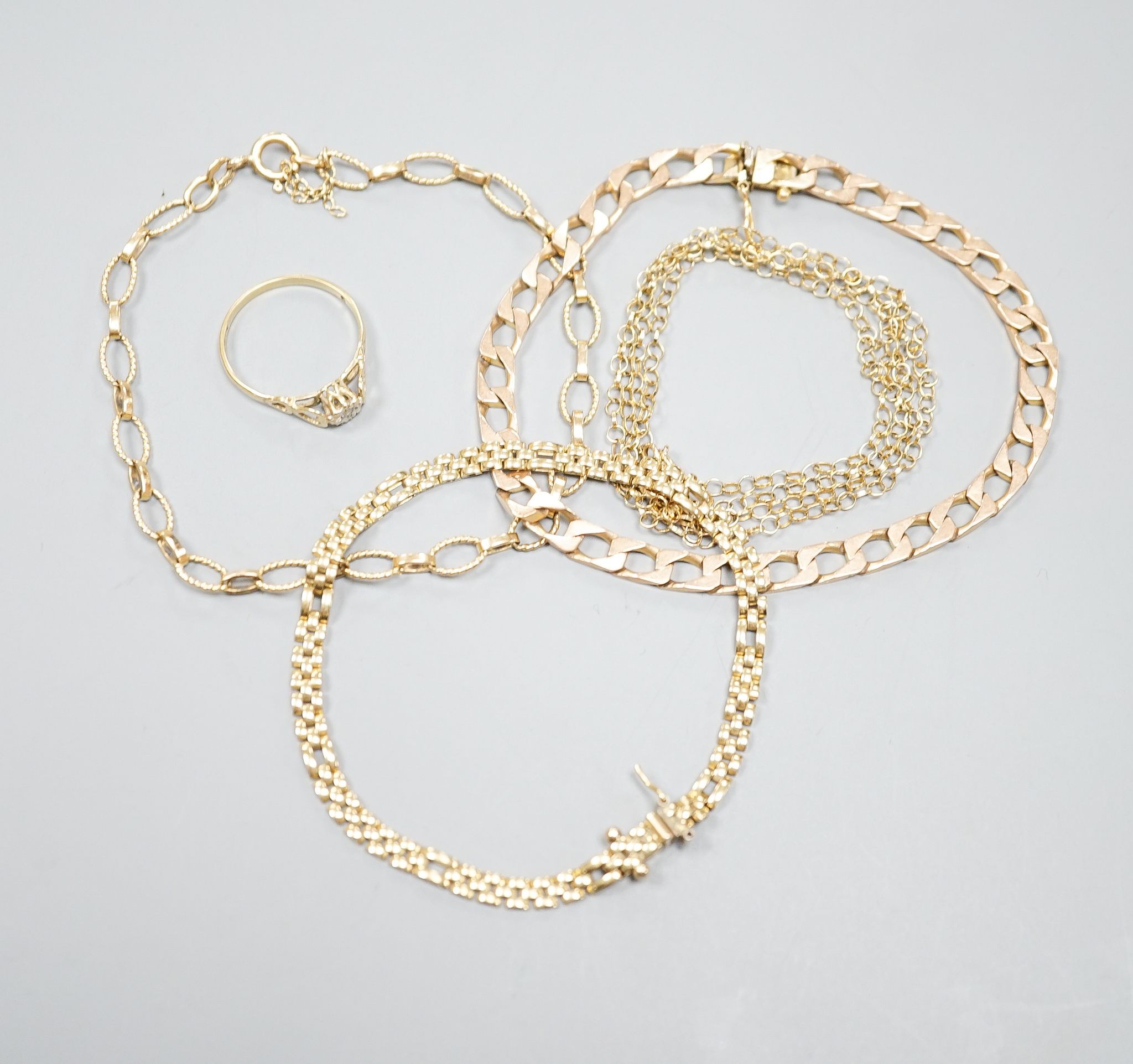 Three assorted 9ct gold bracelets, a 9k chain and a 9ct gold and diamond chip set ring, gross 24.4 grams.